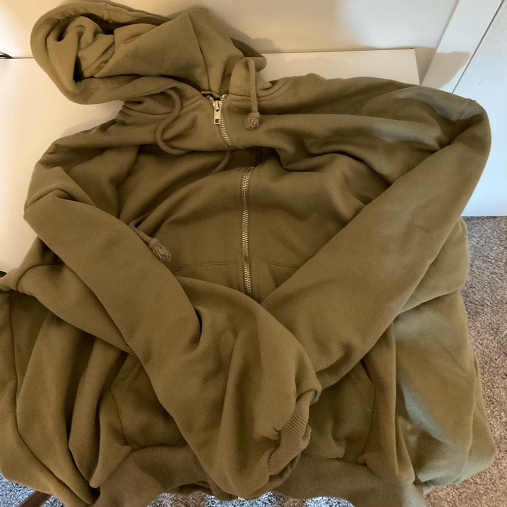 green zip up